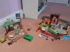 Playmobil 9275 tiny paws hotel combined with 6635 petting zoo