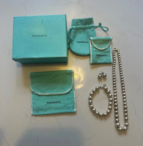 Tiffany signed 925 - &,