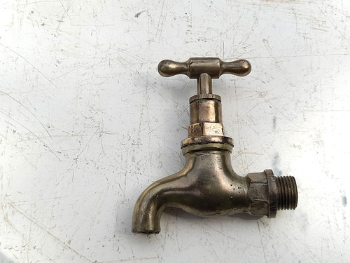 Vintage reclaimed brass tap