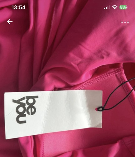 You bright pink skirted - be,