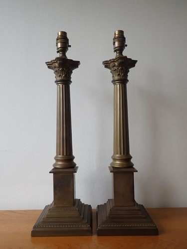 Pair brass corinthian - of,