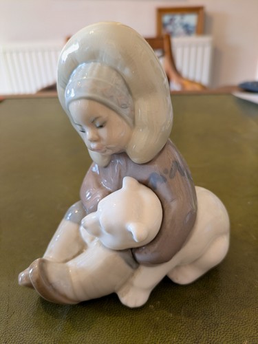 Lladro eskimo girl - with, baby