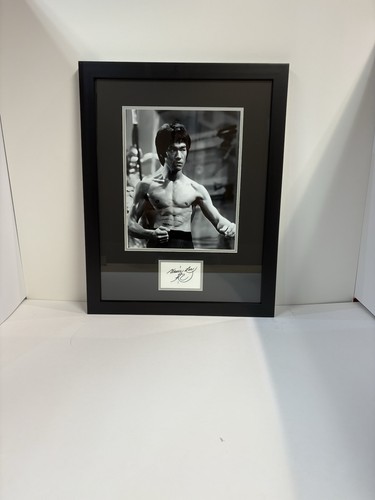 Framed and signed - and,