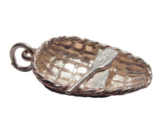 antique silver charm of a rowing boat with an oar for traditional charm bracelet