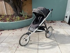 Thule Glide 2 Sport all terrain running buggy pushing pram with rain cover