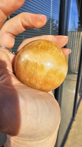 Orange banded calcite sphere - orange,