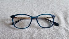 L.K. Bennett green glasses