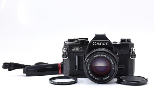 Near mint strap canon - w/strap, ]