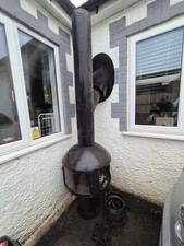 LARGE DOUBLE SIDED CAST IRON ROUND LOG WOOD BURNER, IDEAL FOR PUB/RESTAURANT ETC