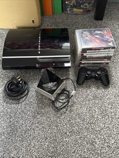 PlayStation 3 80GB Bundle + 9 Games + PS3 Controller Charging Dock