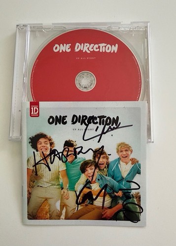 One direction signed - one,