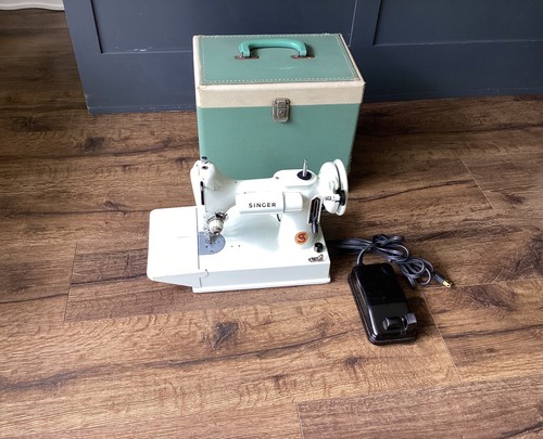 White 1964 singer - white,