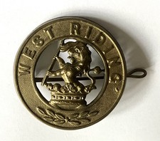 British Army West Riding Regiment blue cloth helmet plate centre