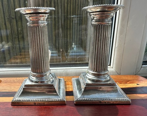 Pair silver weighted - pair, of