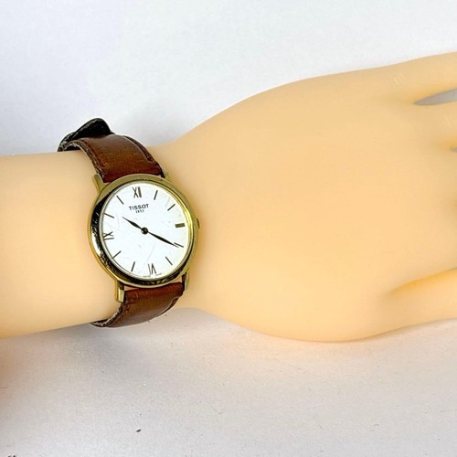 Tissot round quartz watch - quartz,