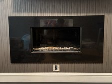 Gas Fireplace With Black Granite Surround Floating/In Wall service required