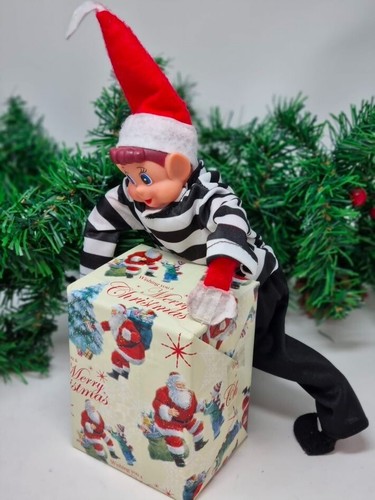 Naughty elf thief prisoner - elf,