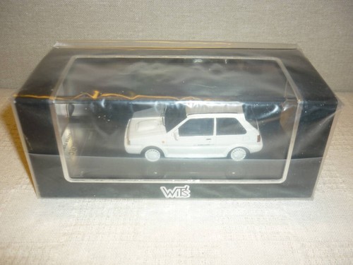 Wit nissan march - march, super