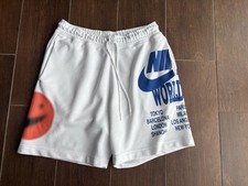 Mens Nike White World Tour Graphic Shorts. Medium