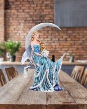Fairy Figurine on Moon with