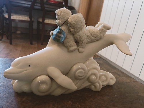 Snowbabies ride the - snowbabies, wave