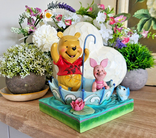 Disney traditions winnie the - traditions,