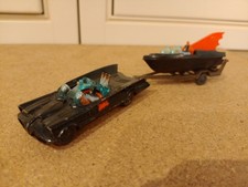 Husky/corgi  Batman,s