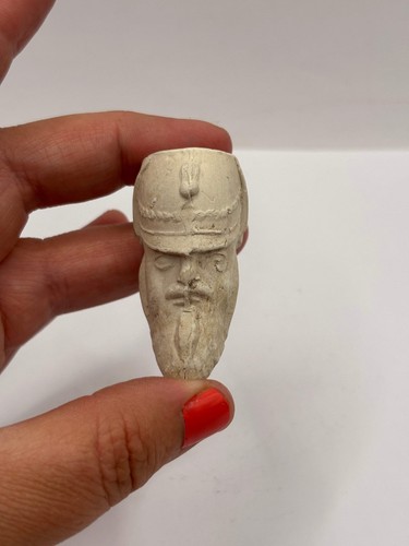 Old figural clay pipe head