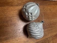 2 large silver Christmas baubles