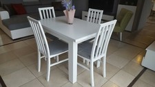 Set of extending dining table