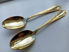 2 perfect Bestecke Solingen 23/4 carat gold plated dessert spoons.