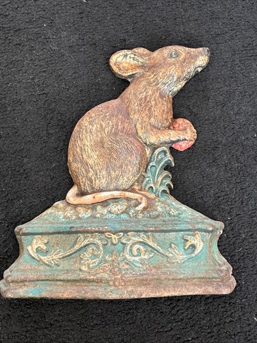 Cast iron door stop - of, a