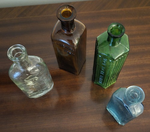Antique embossed glass bottle - embossed,
