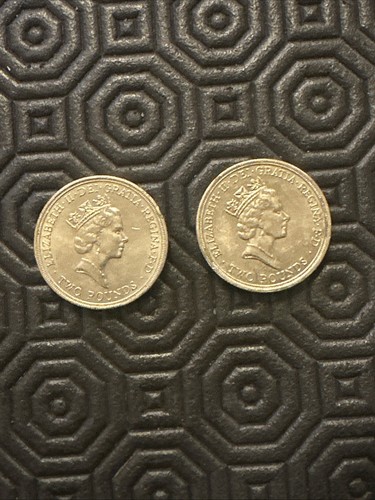 Two collectable pound coins - collectable,