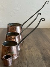 A Set Of Three Vintage Copper