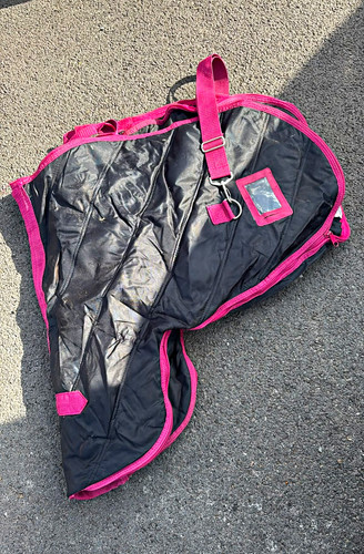 Saddle cover and carrier - and,