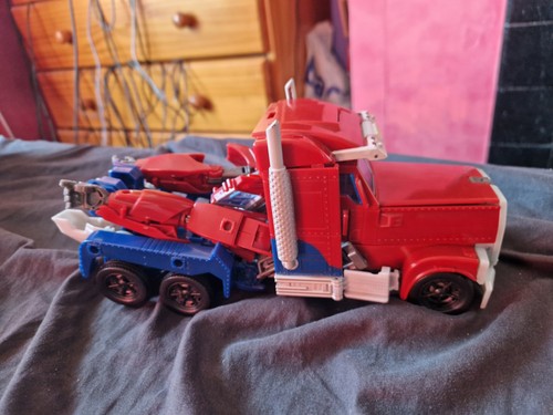 Optimus prime weaponizer - optimus,