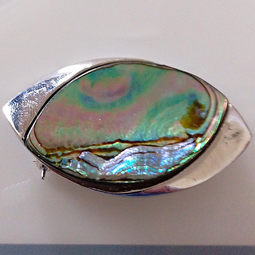 Silver tone oval mother - tone, of