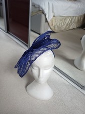 Lovely dark  blue fascinator/hatinator  by Precis Petite good used condition