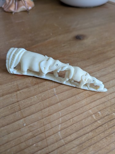 Carved resin elephants - carved,