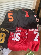 5 College Football shirts 3xl