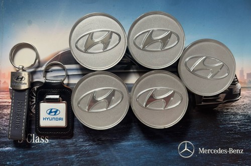 Five hyundai centre wheel caps - five,