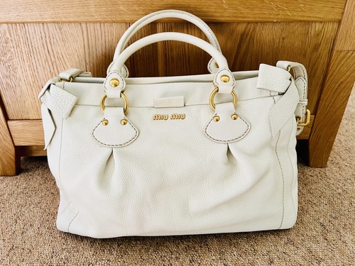 100 authentic miu - 100%,