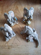 4 Tuskers Elephants Figurines