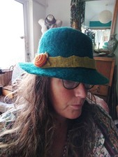 Green Gelt Bowler Like Hat With Felt Flower And Yellow Band