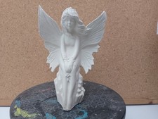 UNPAINTED CERAMIC BISQUE -