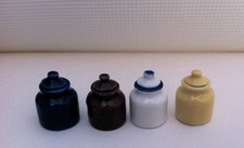 Four Assorted Coloured Storage