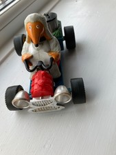 A vintage TV Wombles Marx friction drive toy car rubbish cart with Tomsk