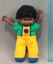 DOLL HANDS HIGH IN THE WORLD