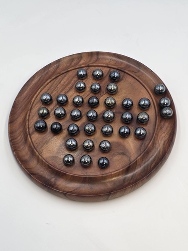 Wooden peg solitaire board - solitaire,